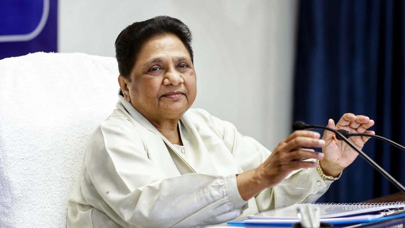 Bahujan Samaj Party leader Mayawati seated at a desk speaking into a microphone. File photograph. फाइल फोटो।