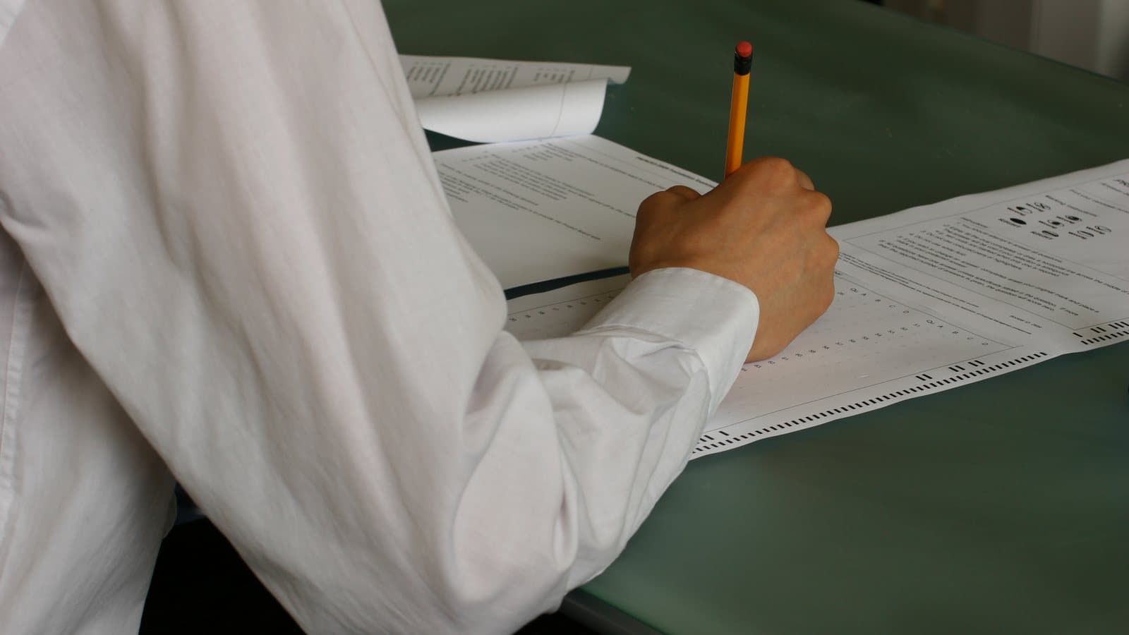 Hand writing exam classroom. File photograph.