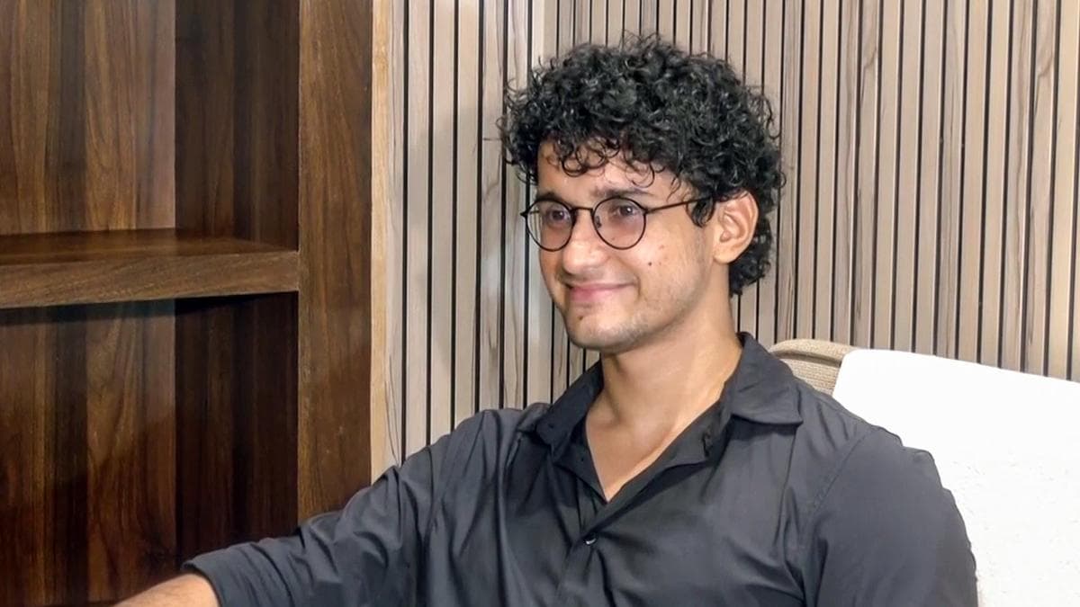 A young man associated with the youth protest movement pictured indoors
