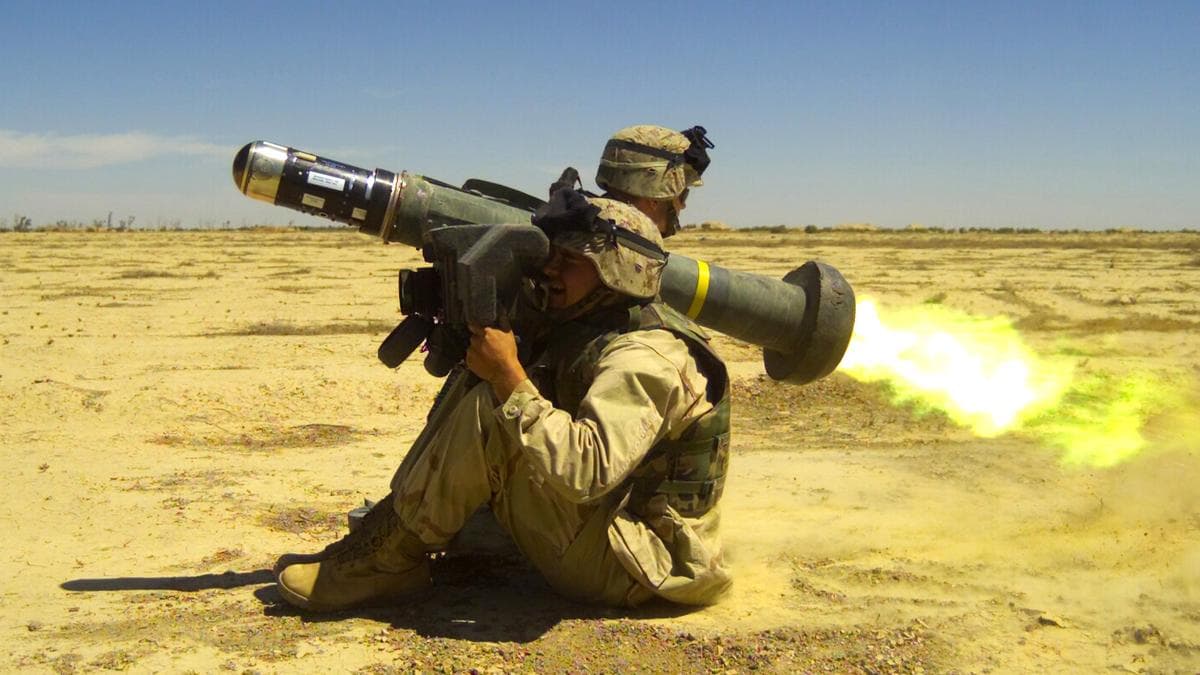 A US soldier fires a Javelin anti-tank missile system in a desert training exercise